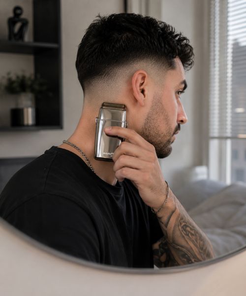 Man maintaining a skin fade at home with the BaByliss PRO FOILFX02 foil shaver.