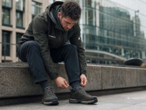 Man lacing up the Approach Shoes while sitting, approach shoes