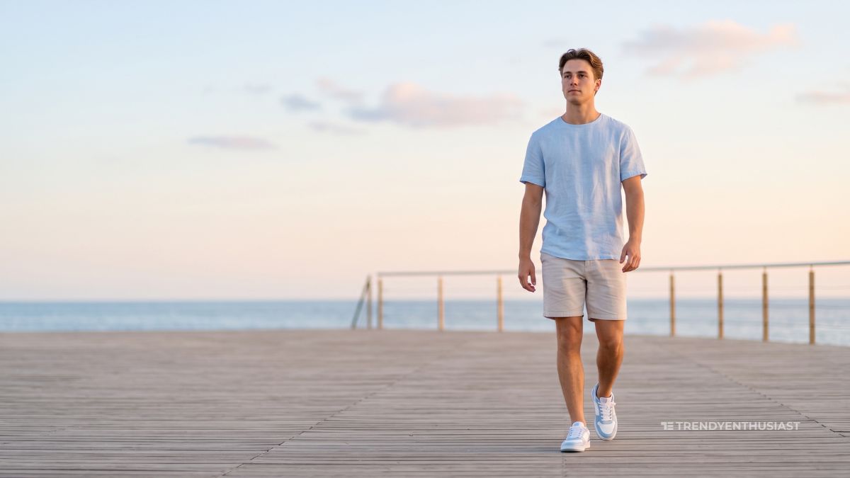 Stylish man wearing sneakers for men on a beach side
