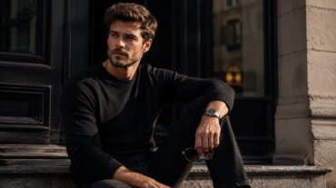Stylish man wearing black jeans with a black sweater